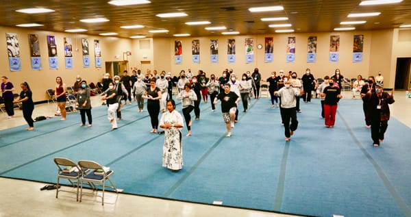 Attendees of the 2022 Rise Conference in a group class