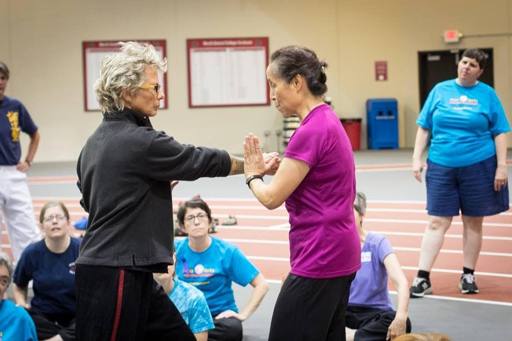 Shifu Kore Grate with Master Su Zifeng demonstrating a block technique in class.
