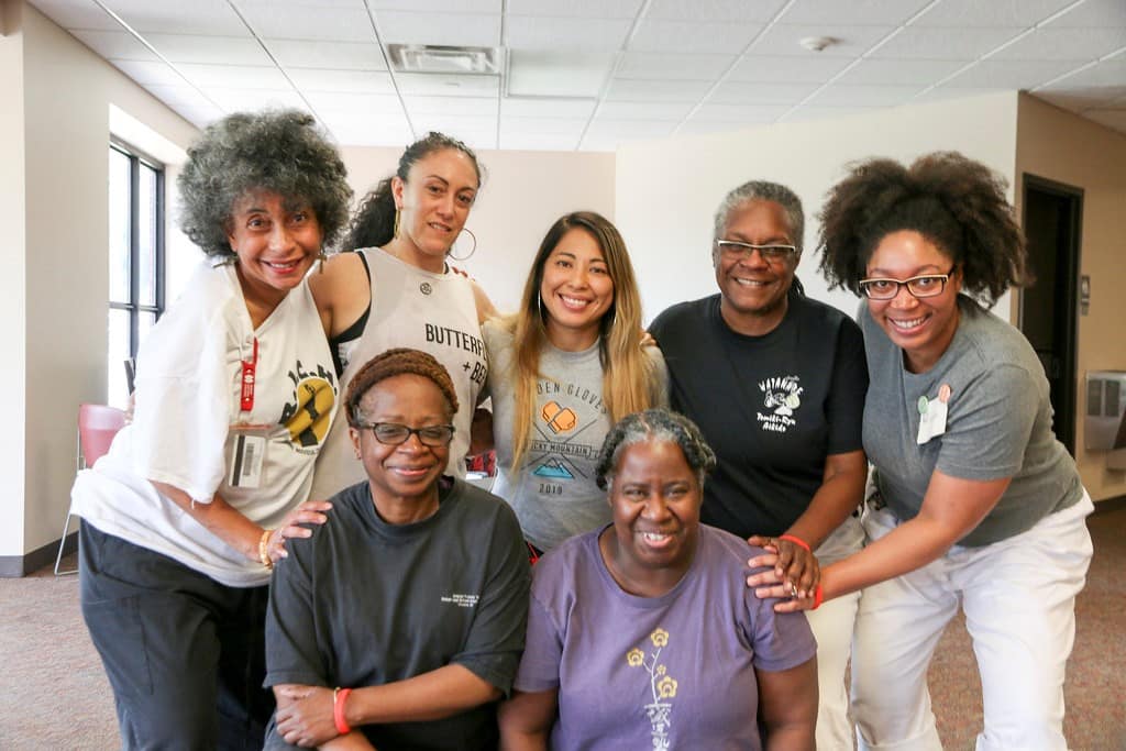 Diverse group of members smiling